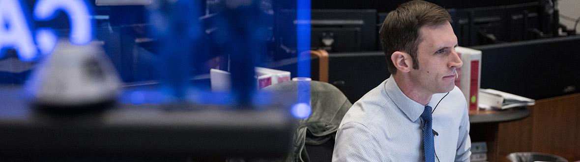 Joshua Kutryk as a capcom at NASA's Mission Control Center