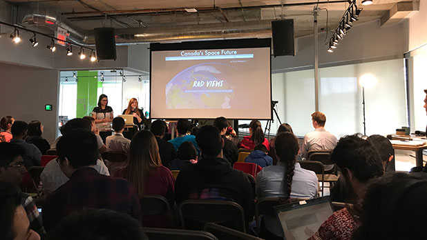 Barbara and Tanya present CitizenCan to judges at Space Apps Toronto.