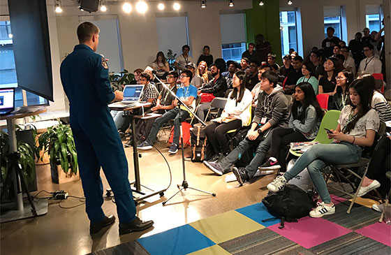 Jeremy Hansen speaks during opening session at Space Apps Toronto