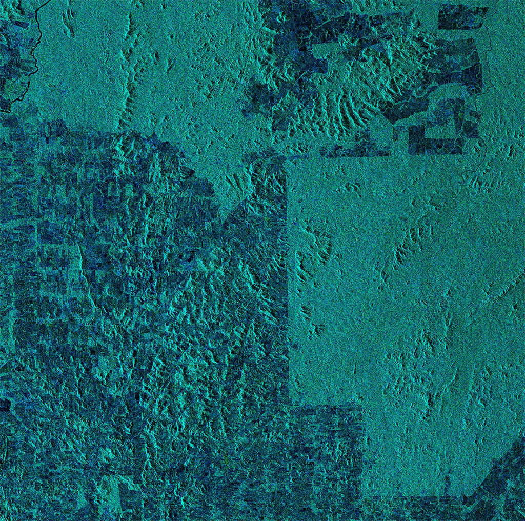 This composite image of the western Amazon in Brazil clearly shows the difference between the dense unlogged section of the forest and the more developed, less dense section of forest. The radar sensor of Canada's RADARSAT-2 satellite is ideal for monitoring cloud-covered tropical regions as it can image through clouds and in any weather conditions. It can help detect illegal logging, including clear cuts as well as selective deforestation. (Credit: RADARSAT-2 Data and Products © MacDonald, Dettwiler and Associates Ltd. (2013) – All rights reserved. RADARSAT is an official trademark of the Canadian Space Agency)