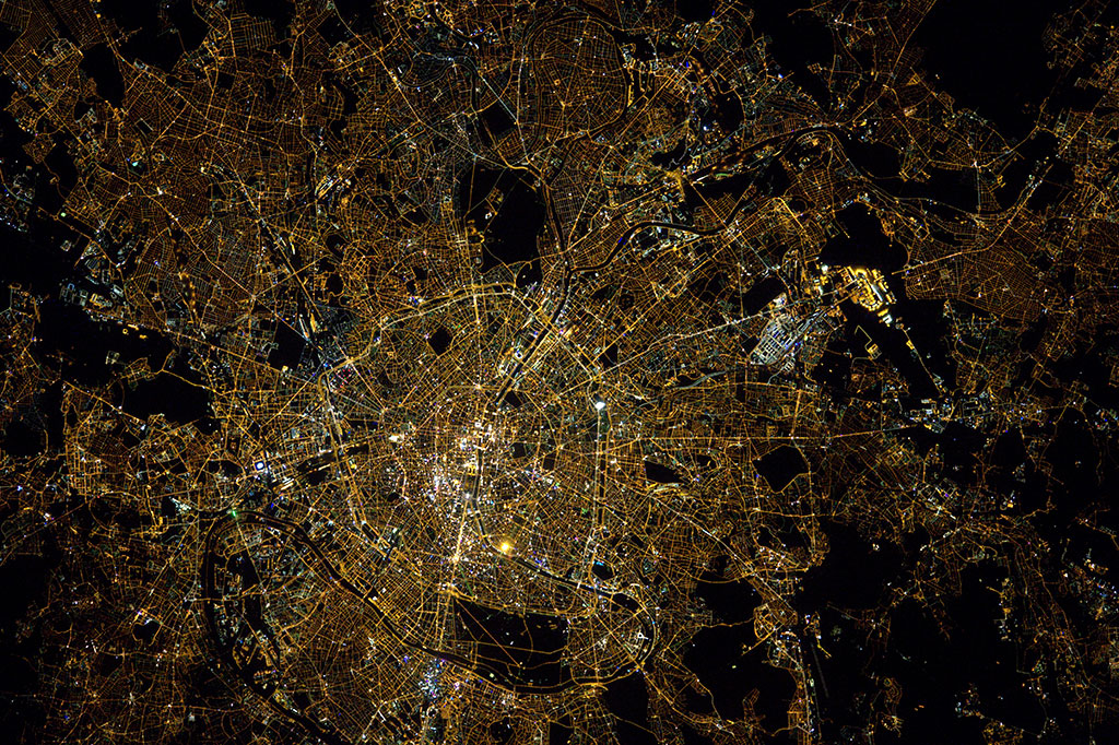 A web of roads and highways is clearly visible in this nighttime photo of Paris taken by French astronaut Thomas Pesquet from aboard the International Space Station. (Credit: European Space Agency)