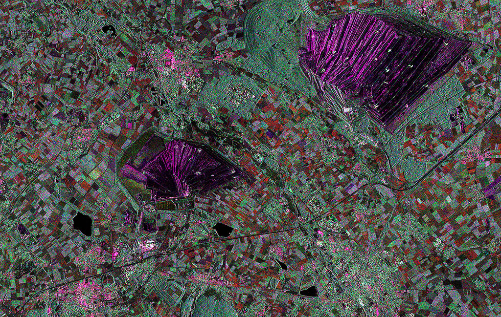 The Tagebau Hambach lignite mine in Germany dominates the top of this RADARSAT-2 image. Satellites like RADARSAT-2 are used by the mining industry to monitor ground movements. (Credit: RADARSAT-2 Data and Products © MacDonald, Dettwiler and Associates Ltd. 2013 – All Rights Reserved. RADARSAT is an official mark of the Canadian Space Agency)