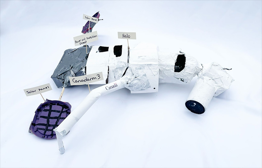 Model with solar panels, HALO, Canadarm3 and power and propulsion element