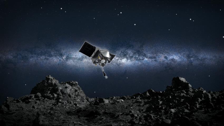 The OSIRIS-REx spacecraft with its sampling arm extended moves in to make contact with the asteroid Bennu.