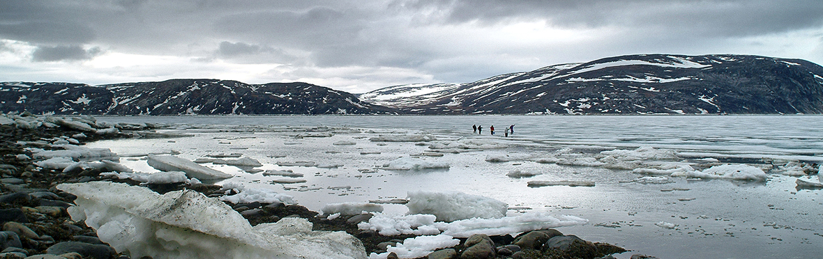 Inuit fishermen travelling on ice
